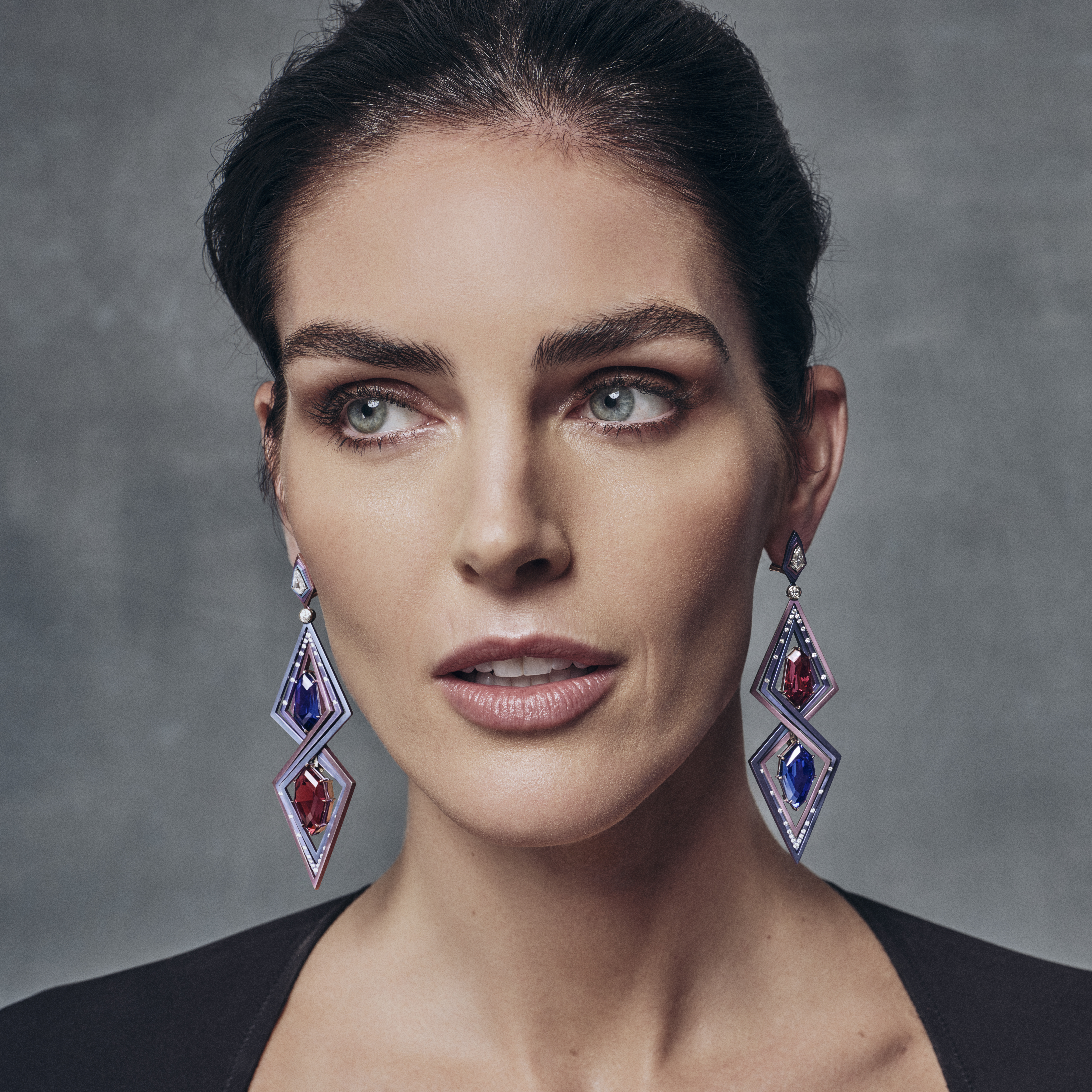 Cromatica Earrings – Model Image AGTA Spectrum Awards 2024 | Tanzanite, Garnet, Diamond, Titanium, White Gold Earrings | Cromatica