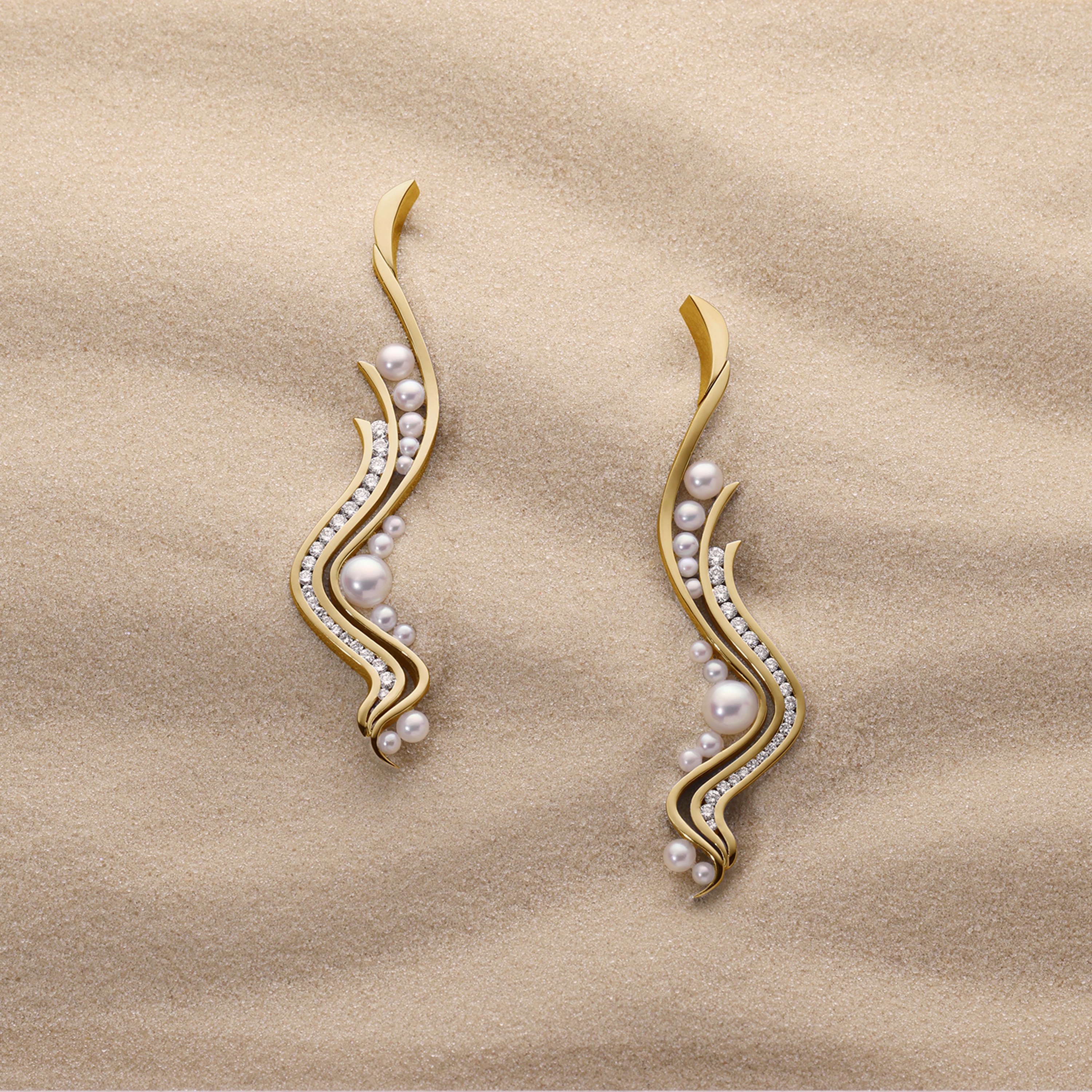 Shoreline Akoya Pearl & Diamond Earrings | Adam Neeley Laguna Collection Hero LG ADAM NEELEY™ Shoreline fine jewelry earrings in 14kt yellow gold with 24 Akoya pearls and pave diamonds from the Laguna collection.